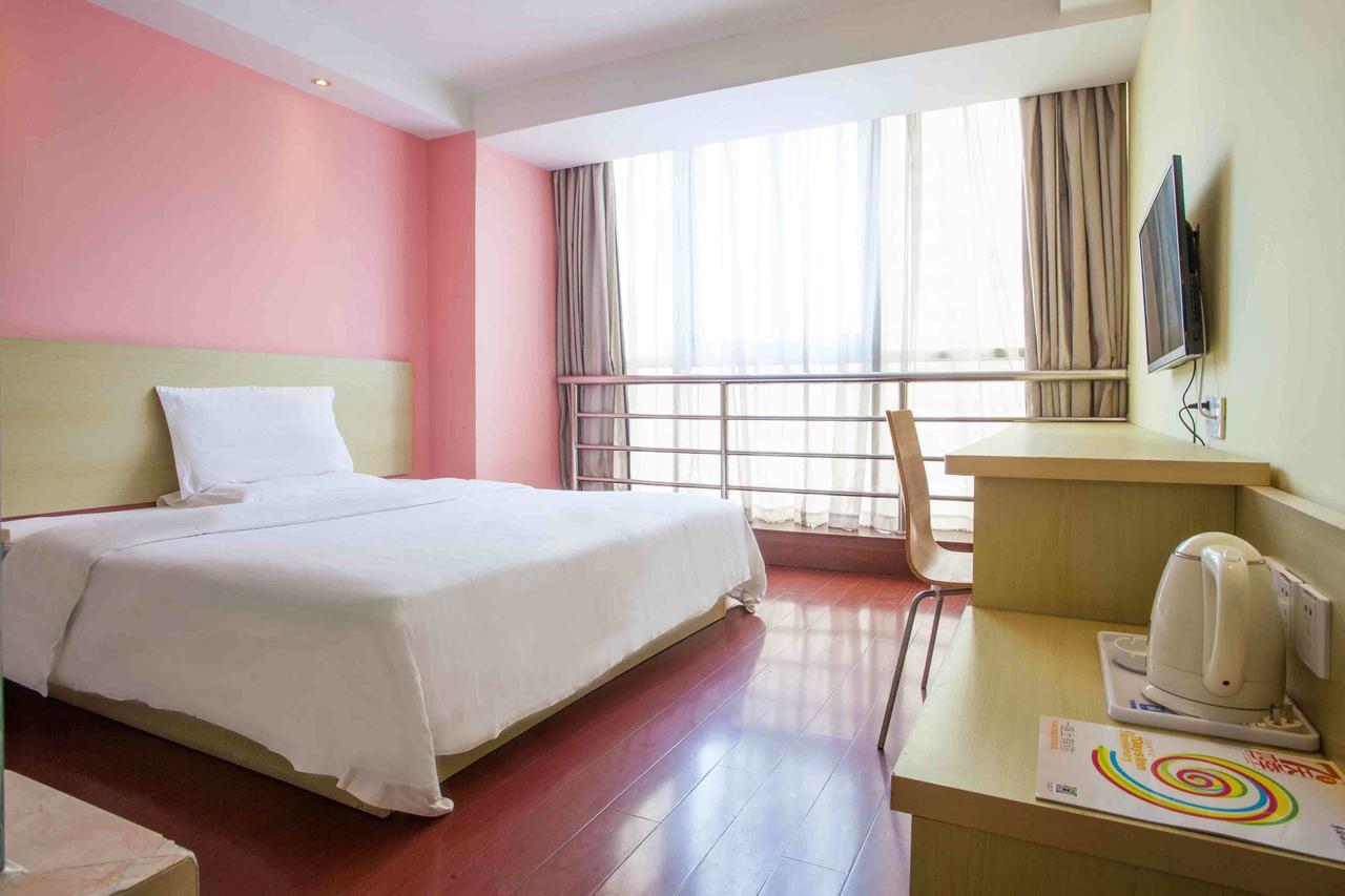 7 Days Inn Yangjiang Xinyue International Studio Zimmer foto